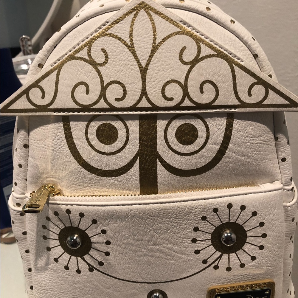 Loungefly It’s a small world mini backpack